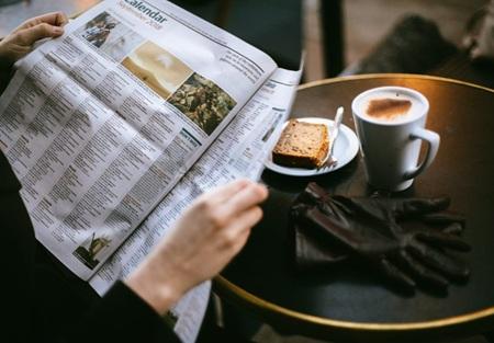 reading a newspaper