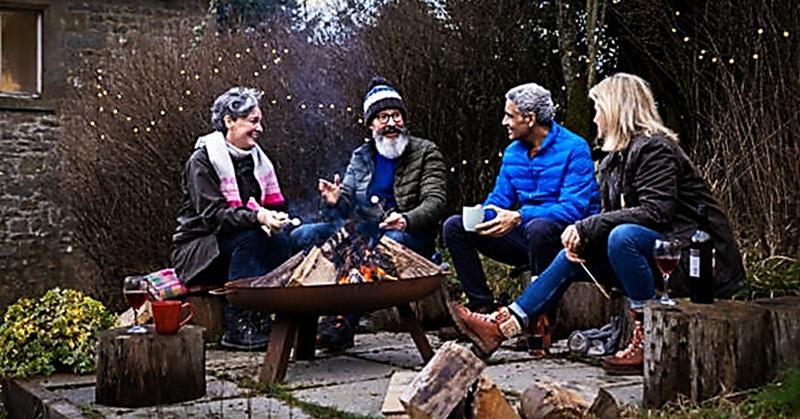 friends around fire pit