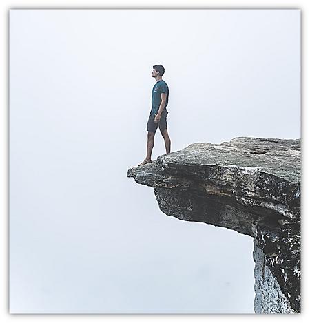 man on cliff
