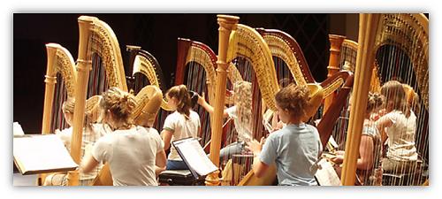 Girls playing harps 